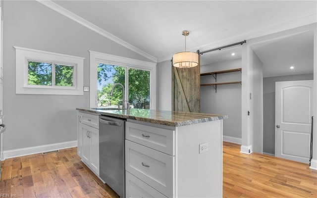 147 Ransone St, Hampton, VA 23669 - kitchen with dishwasher, a sink, light stone counters, lofted ceiling, and light wood-type flooring