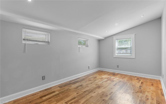 147 Ransone St, Hampton, VA 23669 - unfurnished room with vaulted ceiling, light wood-type flooring, baseboards, and recessed lighting