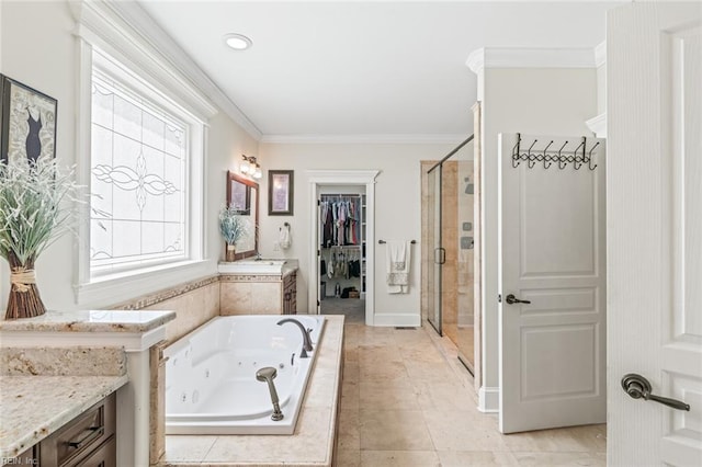 full bathroom with a stall shower, a jetted tub, crown molding, a spacious closet, and vanity