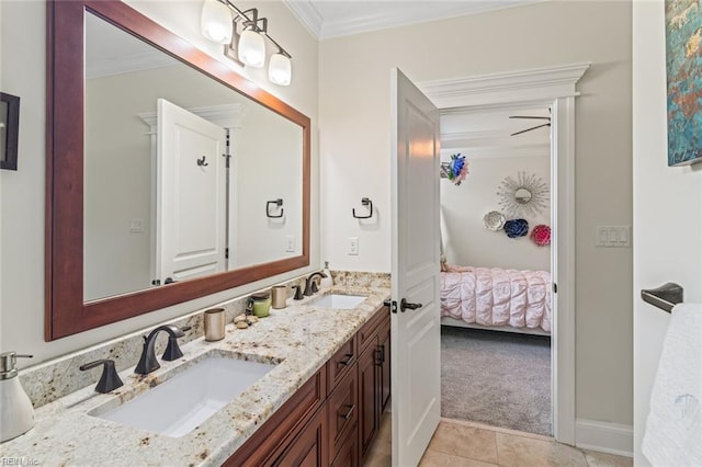 bathroom featuring tile patterned floors, crown molding, ensuite bath, and double vanity