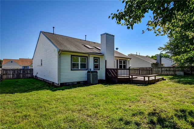 536 Willow Bend Dr, Chesapeake, VA 23323 - rear view of house featuring a wooden deck, a chimney, central AC unit, and a shingled roof