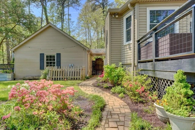 view of side of property with fence