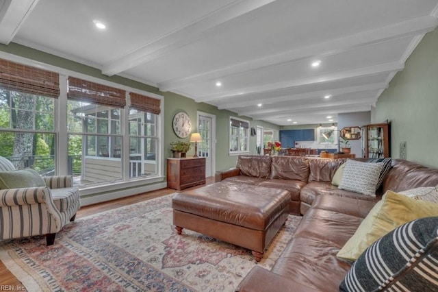 living room featuring wood finished floors, beamed ceiling, and recessed lighting