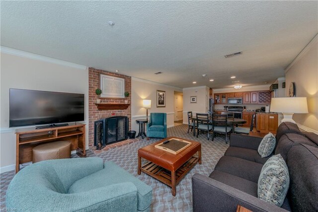 709 Graves Ordinary, Williamsburg, VA 23185 - living room featuring ornamental molding, a fireplace, a textured ceiling, carpet flooring, and recessed lighting