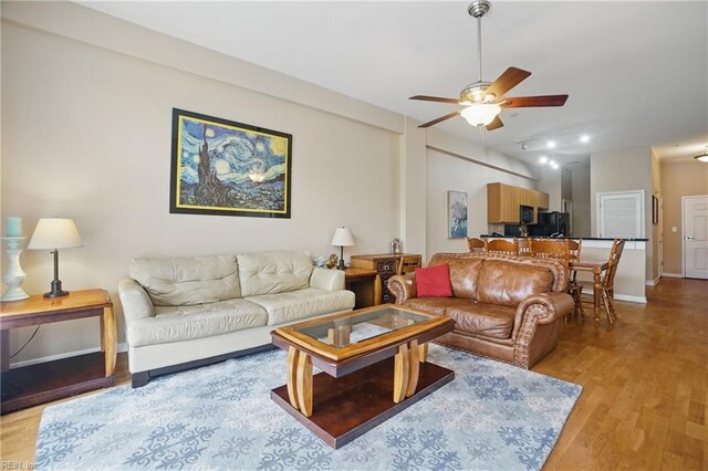 388 Boush St Unit 122, Norfolk, VA 23510 - living area with ceiling fan, light wood-type flooring, and track lighting