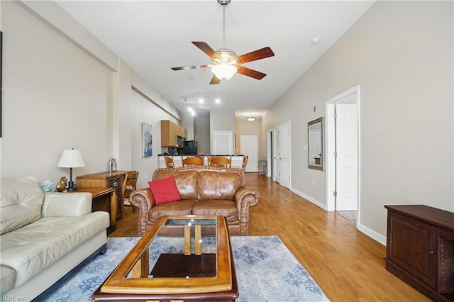 388 Boush St Unit 122, Norfolk, VA 23510 - living area with ceiling fan, light wood-type flooring, and baseboards