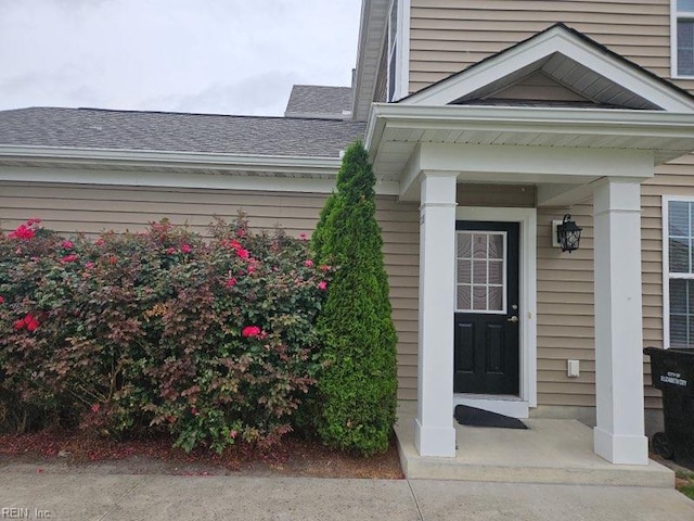202 Spinnaker St Unit B, Elizabeth City, NC 27909 - property entrance featuring a shingled roof