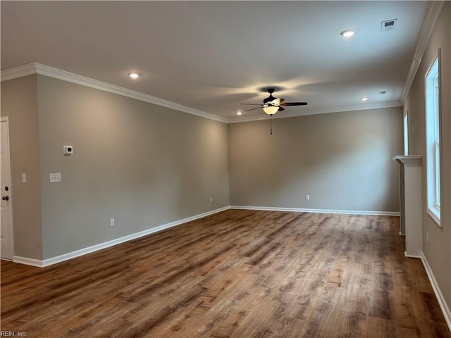 unfurnished room with ceiling fan, baseboards, wood finished floors, crown molding, and recessed lighting