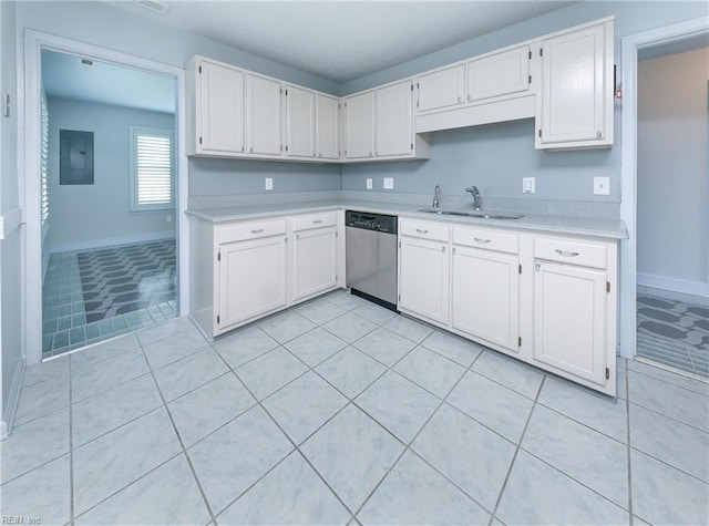 5191 Cypress Point Cir, Virginia Beach, VA 23455 - kitchen featuring stainless steel dishwasher, a sink, light countertops, and white cabinetry