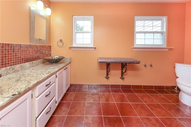 5191 Cypress Point Cir, Virginia Beach, VA 23455 - bathroom with toilet, baseboards, decorative backsplash, and tile patterned floors