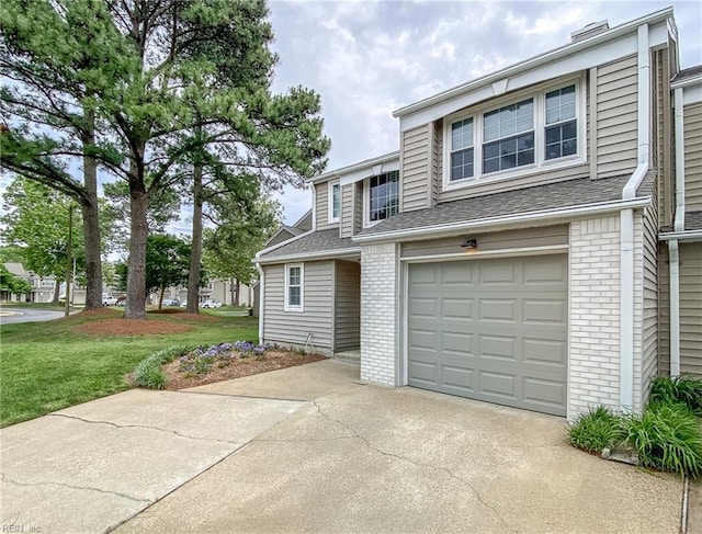5191 Cypress Point Cir, Virginia Beach, VA 23455 - view of front of home with concrete driveway, a garage, a front lawn, brick siding, and a shingled roof