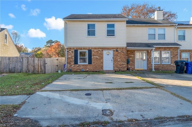 5553 Lynbrook Lndg, Virginia Beach, VA 23462 - view of property with brick siding and a chimney