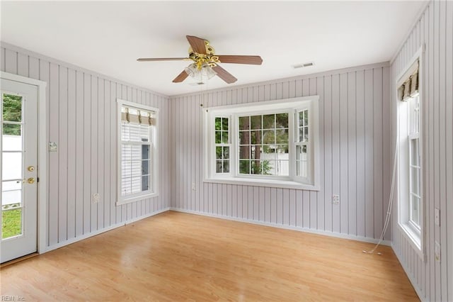414 Bryan Ct, Newport News, VA 23606 - unfurnished room featuring light wood-style flooring, ceiling fan, and baseboards