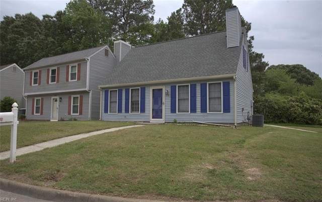 414 Bryan Ct, Newport News, VA 23606 - view of front of house featuring a chimney, a front lawn, and central AC unit