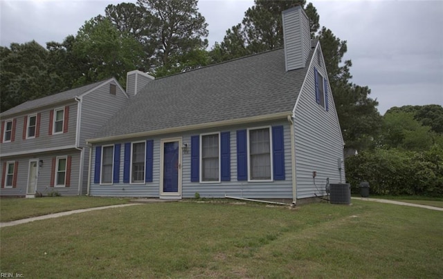 414 Bryan Ct, Newport News, VA 23606 - view of front of home featuring a chimney, a front lawn, and central AC