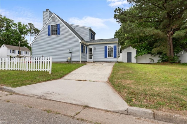 414 Bryan Ct, Newport News, VA 23606 - view of front of house with a chimney, a shed, and an outbuilding