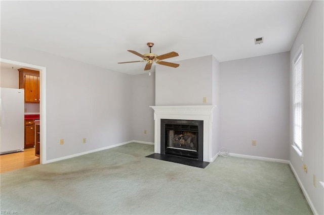 414 Bryan Ct, Newport News, VA 23606 - unfurnished living room featuring light colored carpet, a fireplace with flush hearth, plenty of natural light, and ceiling fan
