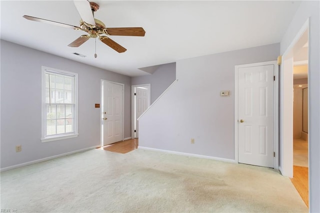 414 Bryan Ct, Newport News, VA 23606 - spare room with light carpet, baseboards, and a ceiling fan