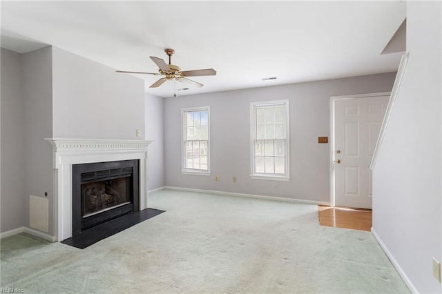 414 Bryan Ct, Newport News, VA 23606 - unfurnished living room featuring carpet floors, a fireplace with flush hearth, baseboards, and a ceiling fan
