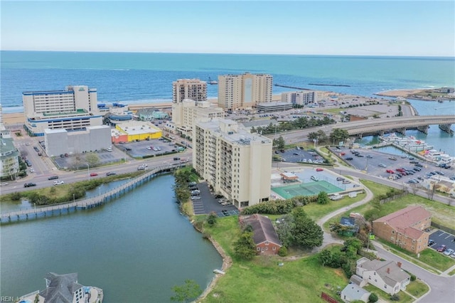 view of urban area with a large body of water