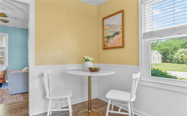 2409 Livesay Rd, Chesapeake, VA 23323 - dining room featuring wood finished floors and wainscoting