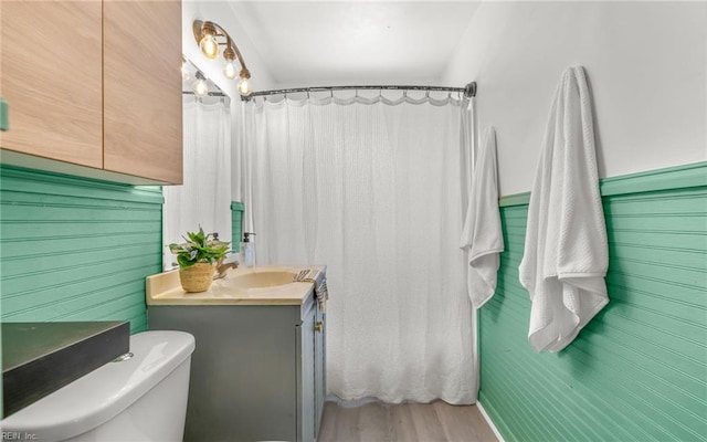 2409 Livesay Rd, Chesapeake, VA 23323 - full bathroom featuring vanity, wood finished floors, and toilet