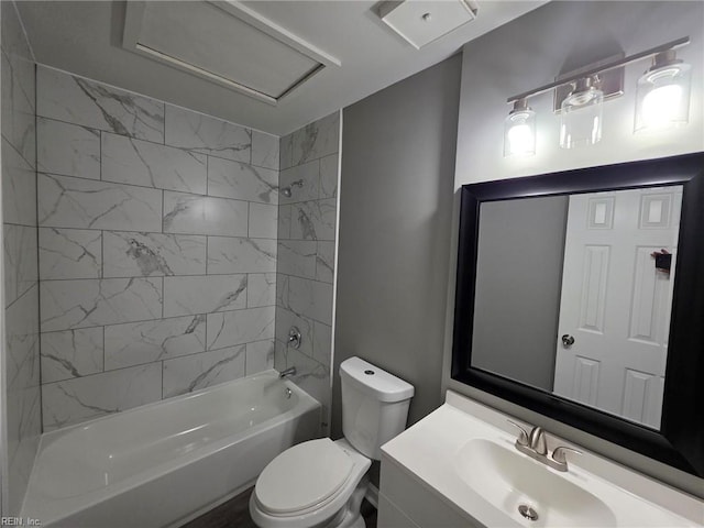 bathroom with toilet,  shower combination, and vanity