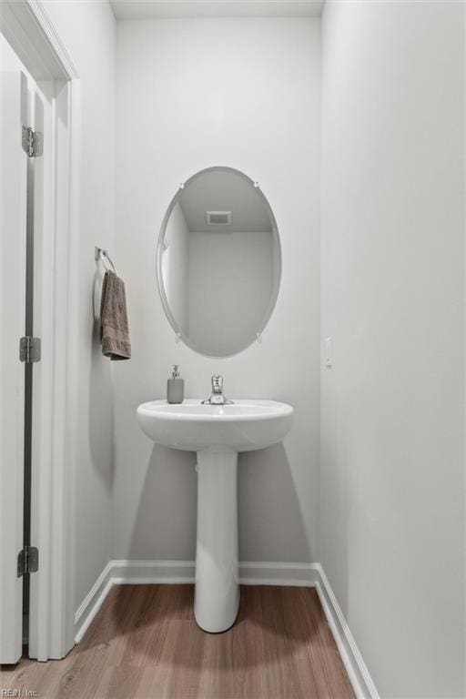 1502 Independence Blvd, Newport News, VA 23608 - bathroom with wood finished floors and baseboards