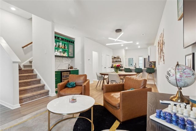 1502 Independence Blvd, Newport News, VA 23608 - living area with wet bar, light wood-style floors, stairs, baseboards, and recessed lighting