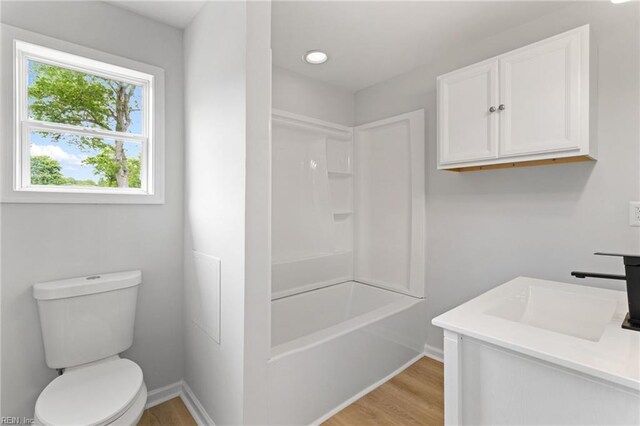 1512 Shell Rd, Chesapeake, VA 23323 - bathroom with wood finished floors, toilet, and baseboards