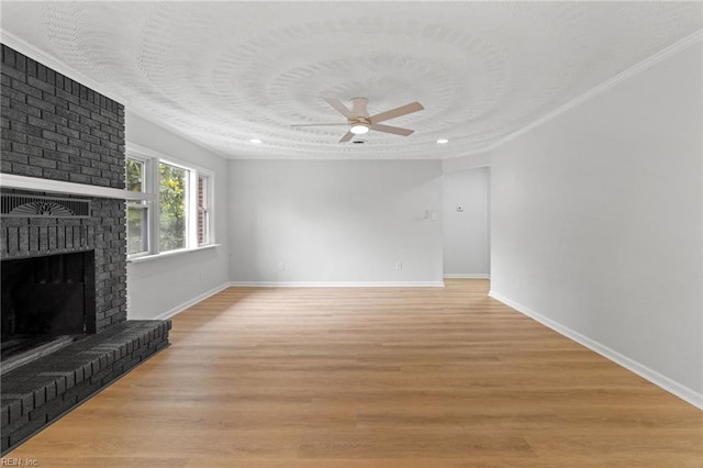 1512 Shell Rd, Chesapeake, VA 23323 - unfurnished living room featuring a brick fireplace, ceiling fan, baseboards, light wood-type flooring, and crown molding