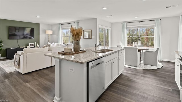 300 Mizzen Way, Elizabeth City, NC 27909 - kitchen featuring stainless steel dishwasher, a sink, dark wood-type flooring, light stone counters, and recessed lighting