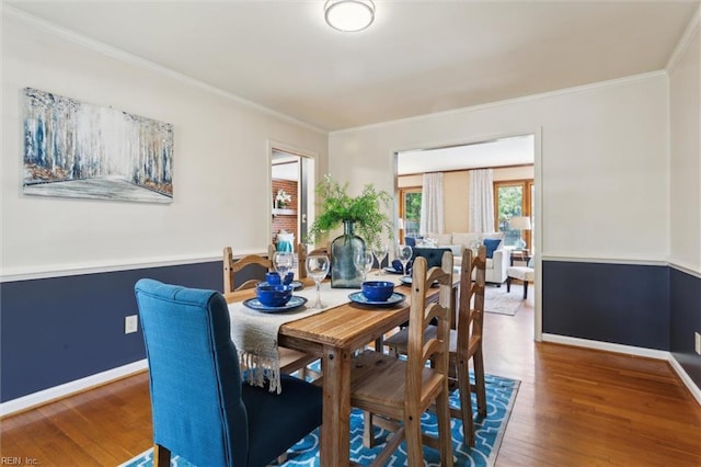 611 Windemere Rd, Newport News, VA 23602 - dining area with wood finished floors, ornamental molding, and baseboards