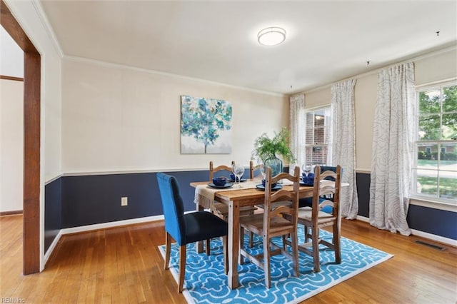 611 Windemere Rd, Newport News, VA 23602 - dining room featuring wood finished floors, ornamental molding, and baseboards
