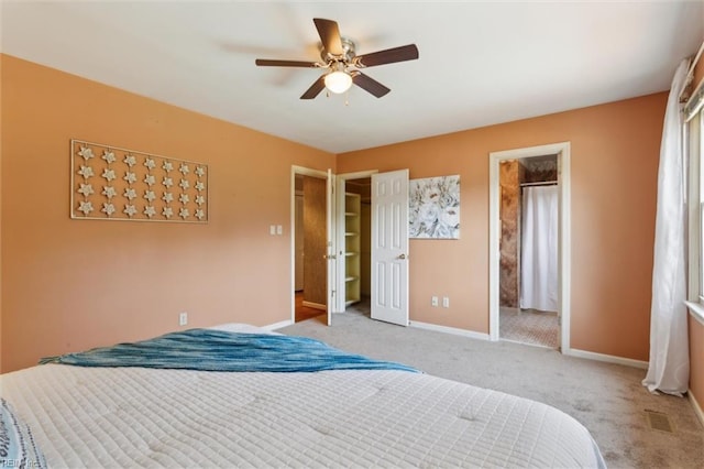 611 Windemere Rd, Newport News, VA 23602 - bedroom featuring carpet flooring, baseboards, a ceiling fan, and ensuite bath