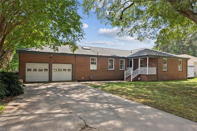 611 Windemere Rd, Newport News, VA 23602 - ranch-style home featuring brick siding, a garage, concrete driveway, a front yard, and crawl space