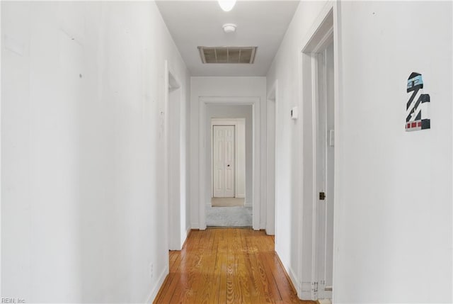 512 S End Rd, Knotts Island, NC 27950 - corridor featuring light wood finished floors and baseboards