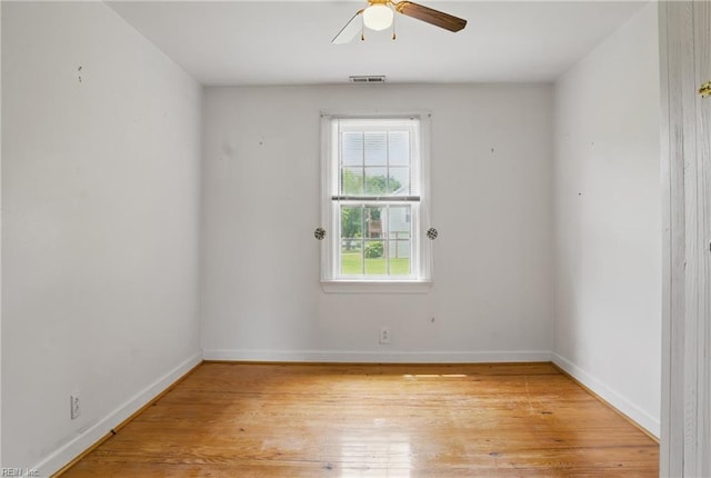 512 S End Rd, Knotts Island, NC 27950 - unfurnished room featuring a ceiling fan, light wood finished floors, and baseboards