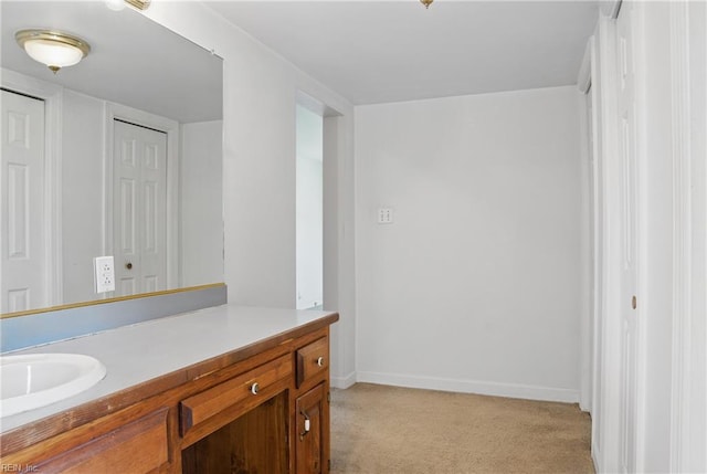 512 S End Rd, Knotts Island, NC 27950 - bathroom featuring baseboards and vanity