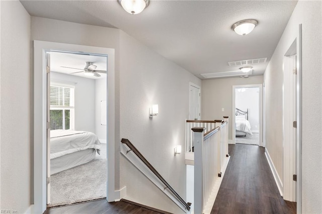 219 Dunway Ln, Chesapeake, VA 23323 - hallway featuring an upstairs landing, dark wood finished floors, and baseboards