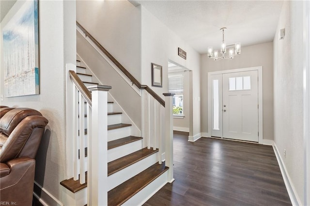 219 Dunway Ln, Chesapeake, VA 23323 - foyer entrance with a chandelier, dark wood finished floors, stairs, and baseboards