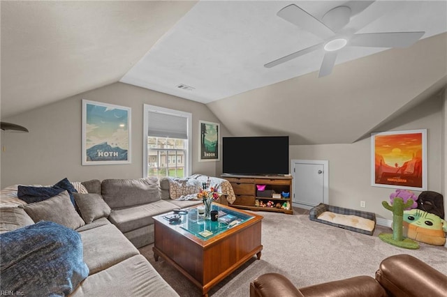 living room with carpet floors, vaulted ceiling, and ceiling fan