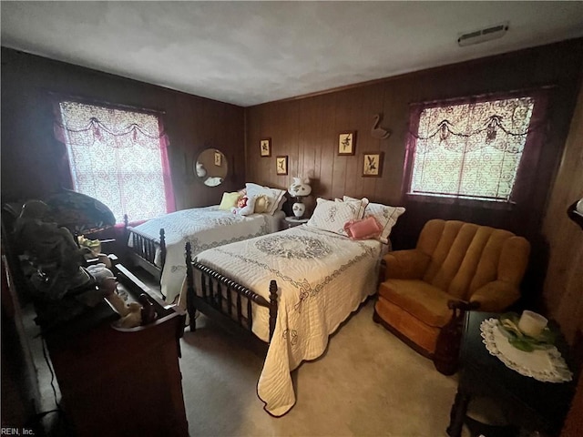 3328 Northgate Dr, Virginia Beach, VA 23452 - carpeted bedroom with multiple windows and wood walls