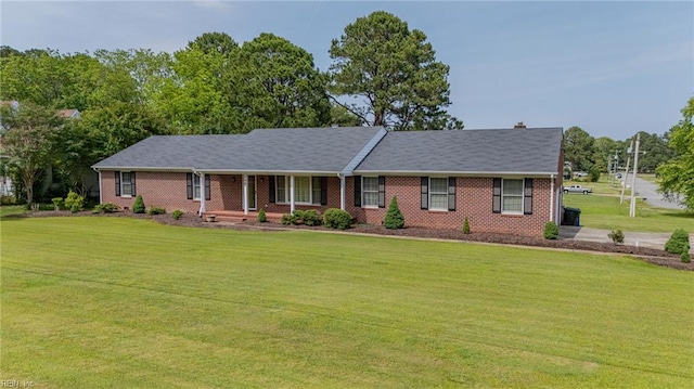 136 Crescent Dr, Franklin, VA 23851 - ranch-style home with a front yard, brick siding, and covered porch