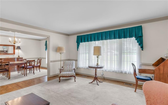 136 Crescent Dr, Franklin, VA 23851 - office space featuring ornamental molding, wood finished floors, a chandelier, and baseboards