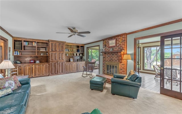 136 Crescent Dr, Franklin, VA 23851 - living area featuring ornamental molding, carpet flooring, a ceiling fan, and a brick fireplace