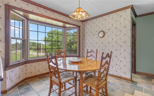 136 Crescent Dr, Franklin, VA 23851 - dining space with baseboards, a chandelier, wallpapered walls, and ornamental molding
