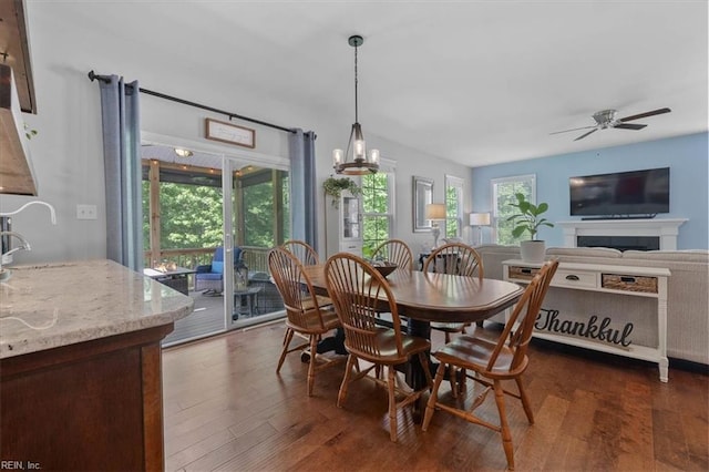 7935 Patriots Landing Pl, Quinton, VA 23141 - dining area with dark wood-type flooring and a ceiling fan