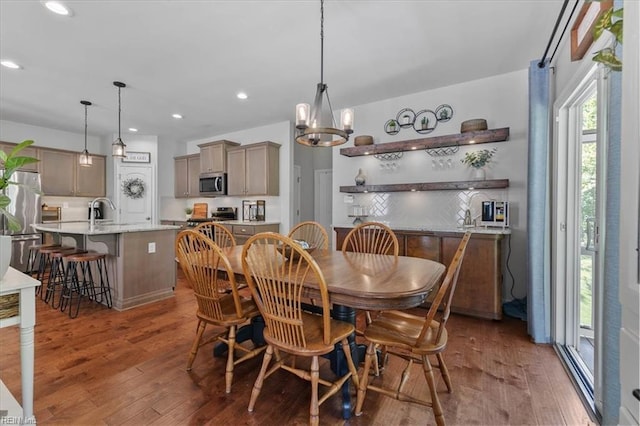 7935 Patriots Landing Pl, Quinton, VA 23141 - dining space featuring hardwood / wood-style flooring, a chandelier, and recessed lighting