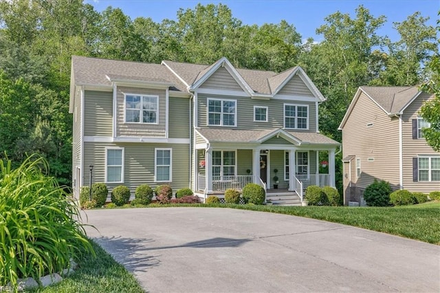 7935 Patriots Landing Pl, Quinton, VA 23141 - view of front of home featuring covered porch and view of wooded area